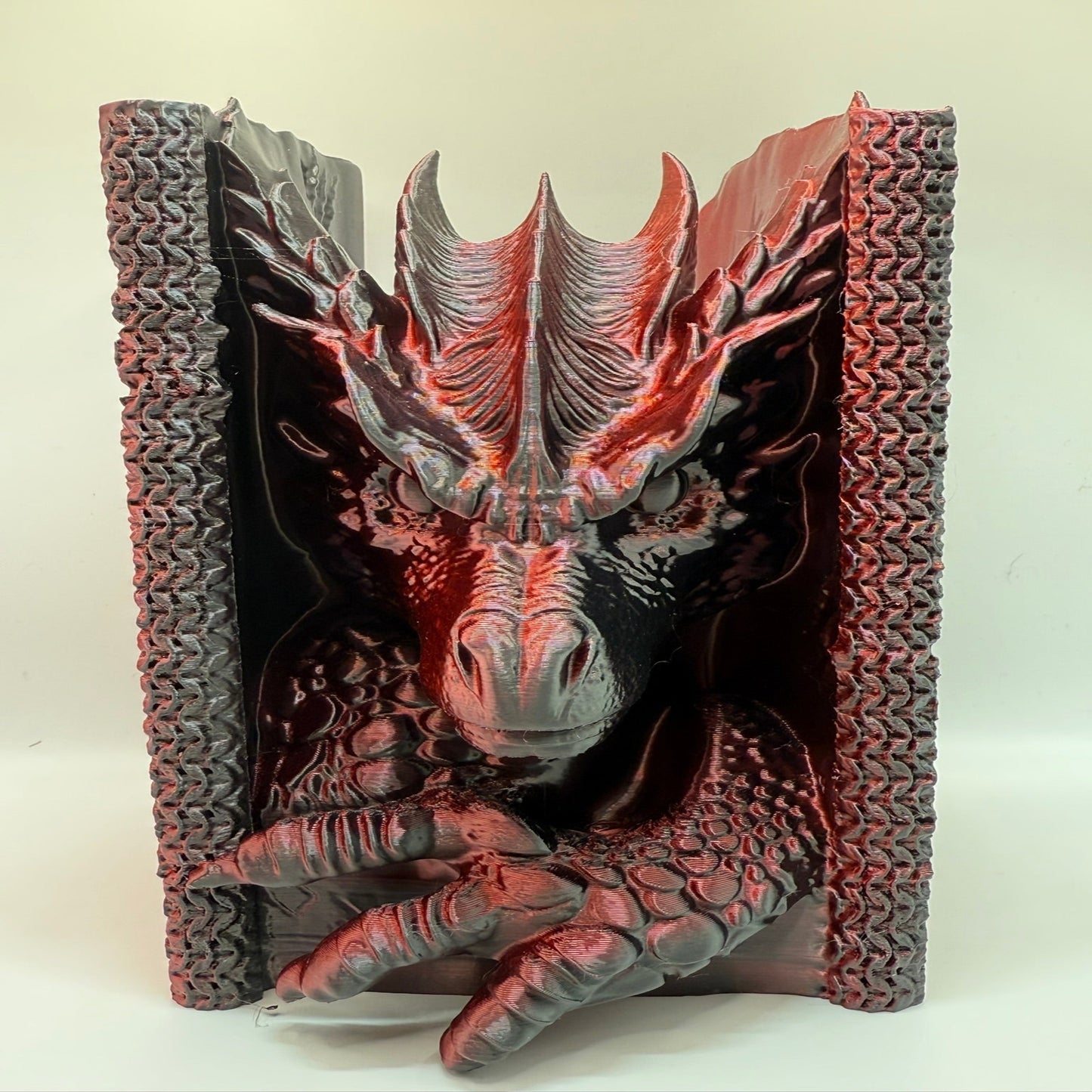 3D dragon bookend on a white background