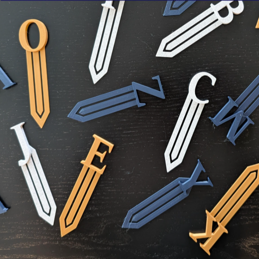 Colorful sword-shaped objects on a dark surface